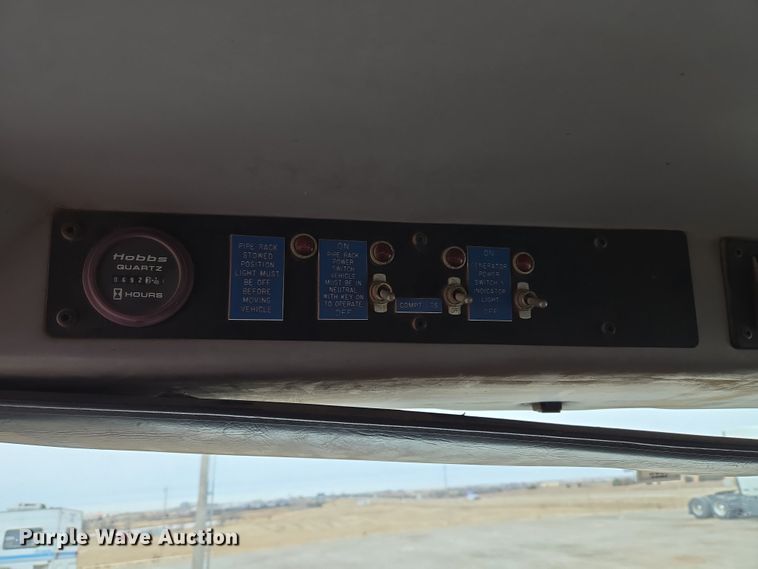 image for item ET1176 2002 Freightliner FL70 flatbed truck