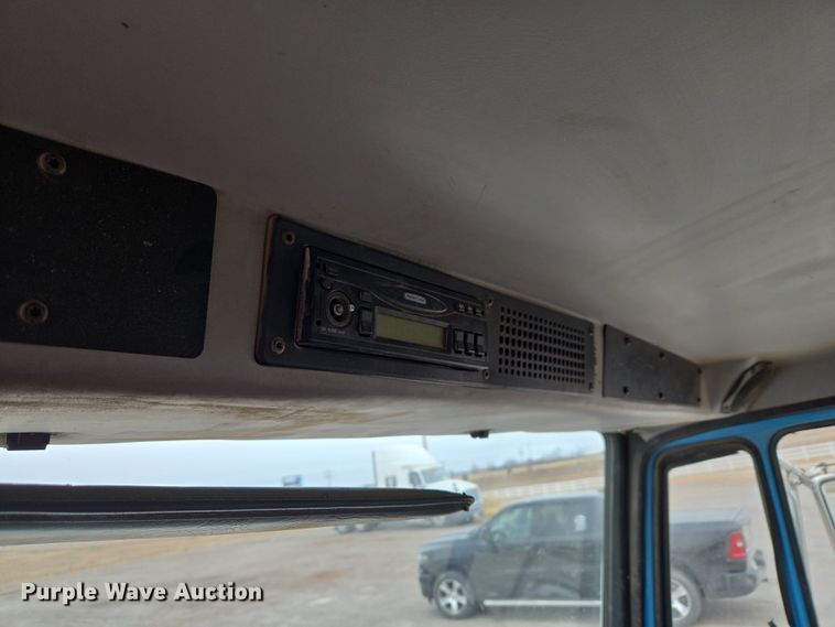 image for item ET1176 2002 Freightliner FL70 flatbed truck