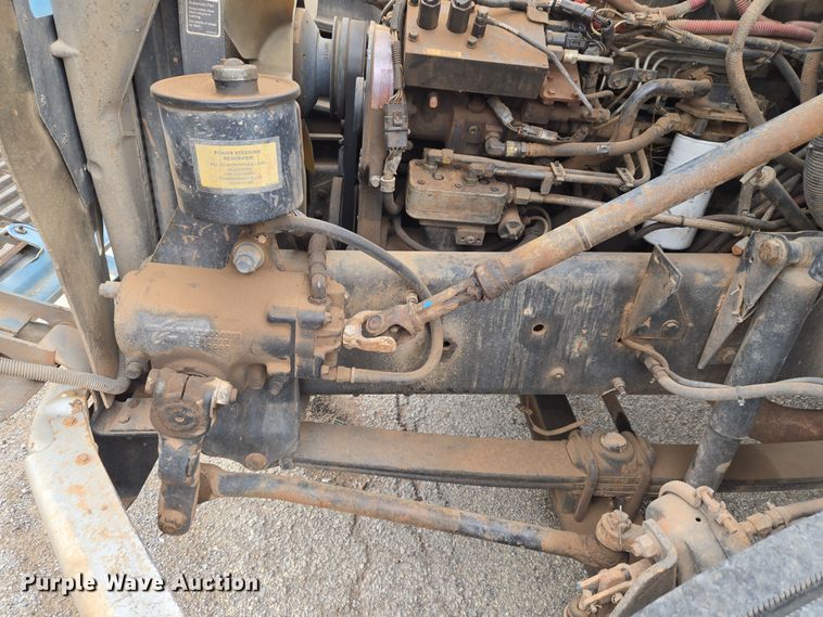 image for item ET1176 2002 Freightliner FL70 flatbed truck