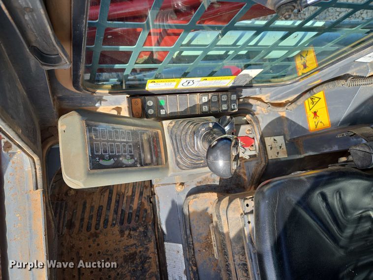 image for item ET1240 2017 Takeuchi TL8 tracked skid steer loader