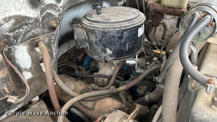 image for item FG0020 1989 GMC C7 digger derrick truck