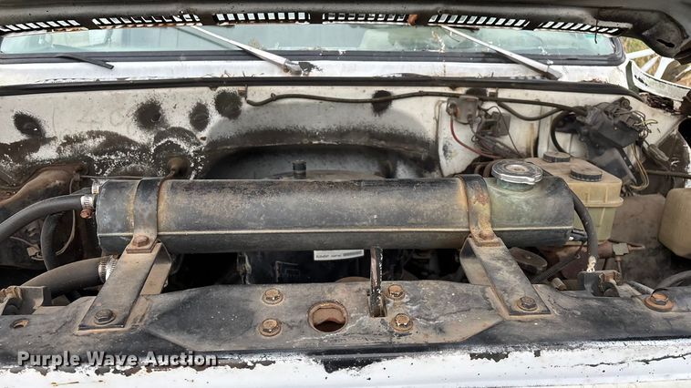 image for item FG0020 1989 GMC C7 digger derrick truck