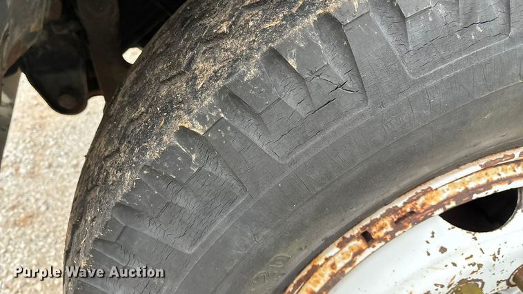 image for item FG0020 1989 GMC C7 digger derrick truck