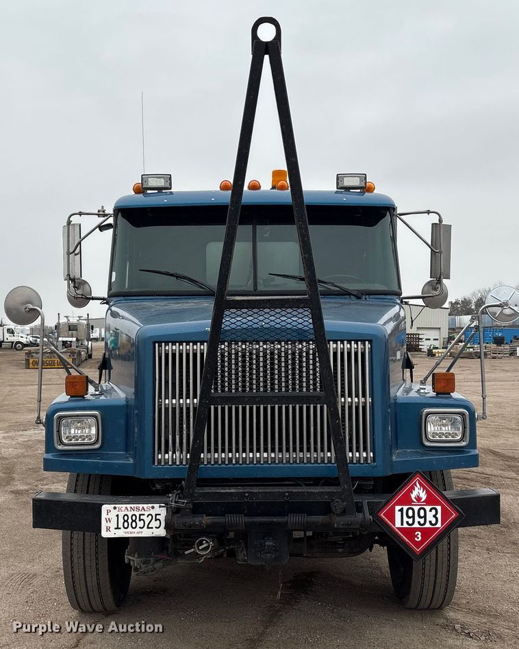 image for item FG2640 1997 Volvo WG-64T flatbed truck