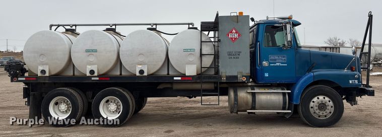 image for item FG2640 1997 Volvo WG-64T flatbed truck