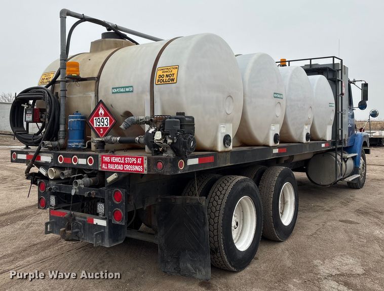 image for item FG2640 1997 Volvo WG-64T flatbed truck