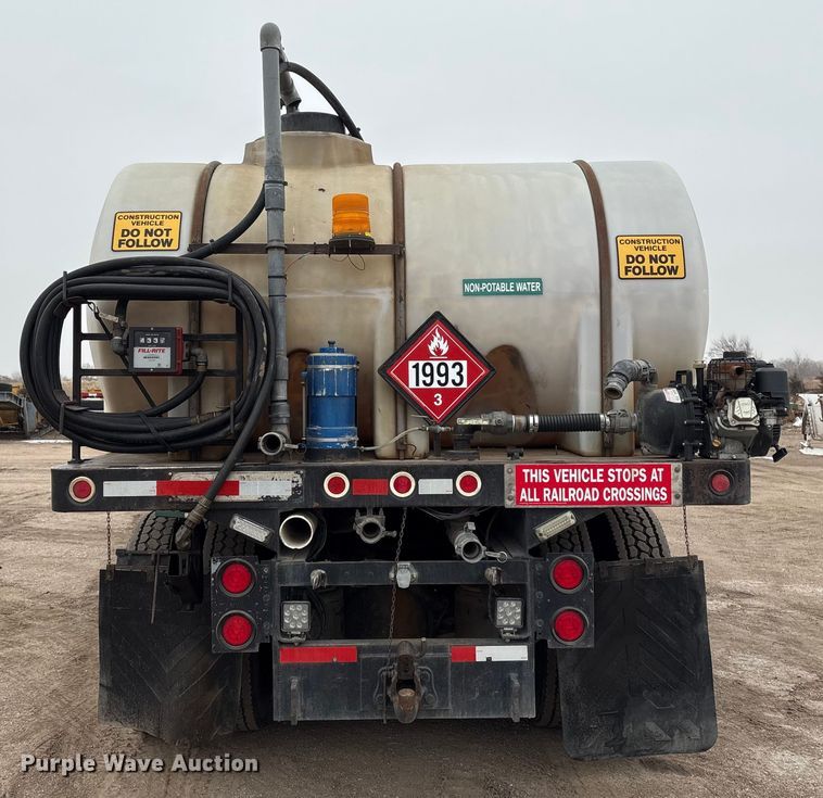 image for item FG2640 1997 Volvo WG-64T flatbed truck