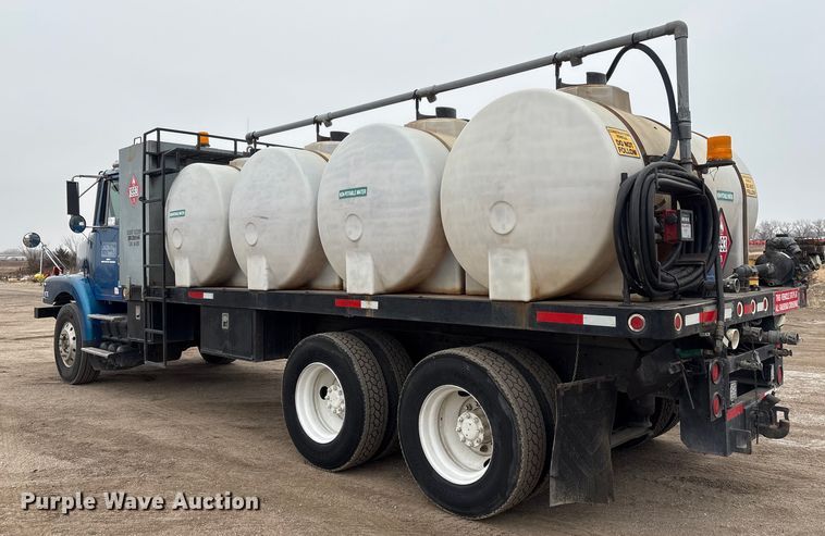 image for item FG2640 1997 Volvo WG-64T flatbed truck