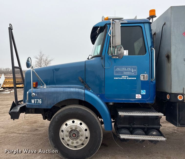 image for item FG2640 1997 Volvo WG-64T flatbed truck