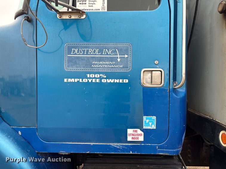 image for item FG2640 1997 Volvo WG-64T flatbed truck