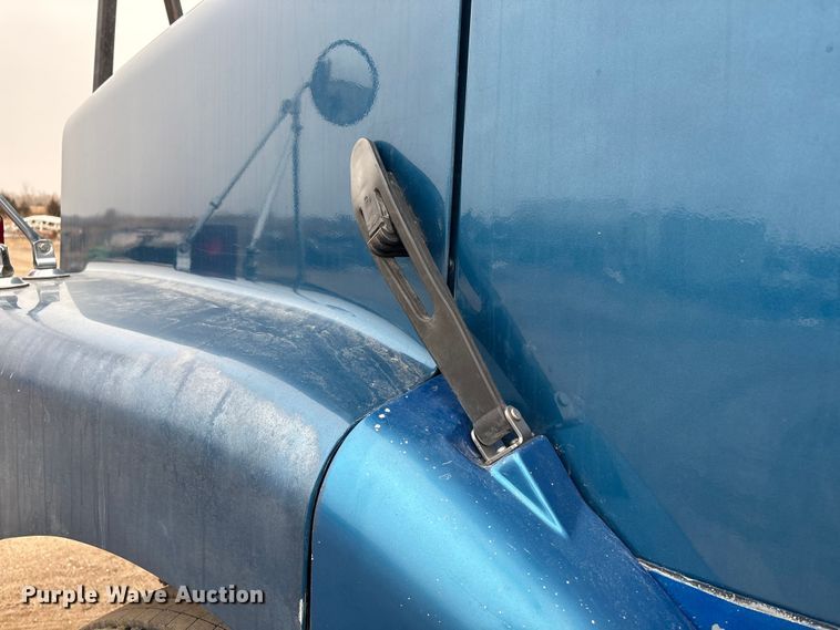 image for item FG2640 1997 Volvo WG-64T flatbed truck