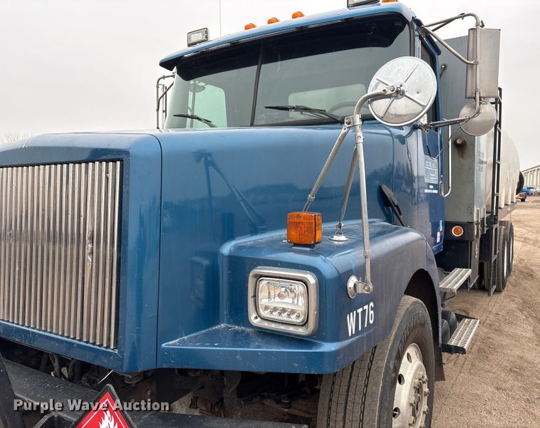 image for item FG2640 1997 Volvo WG-64T flatbed truck