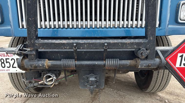 image for item FG2640 1997 Volvo WG-64T flatbed truck