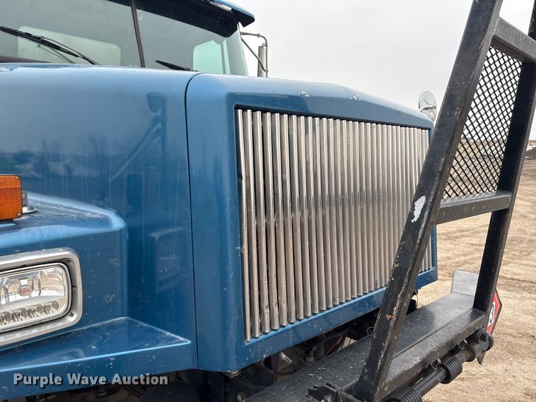 image for item FG2640 1997 Volvo WG-64T flatbed truck