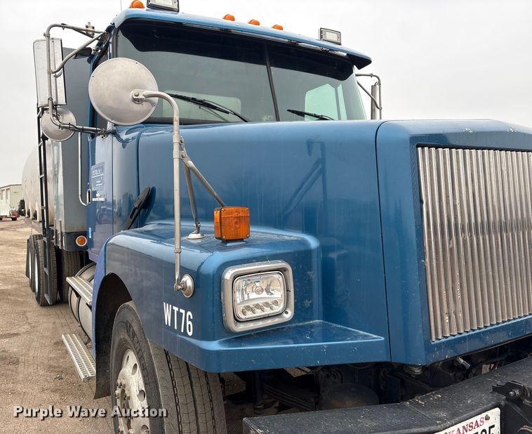 image for item FG2640 1997 Volvo WG-64T flatbed truck