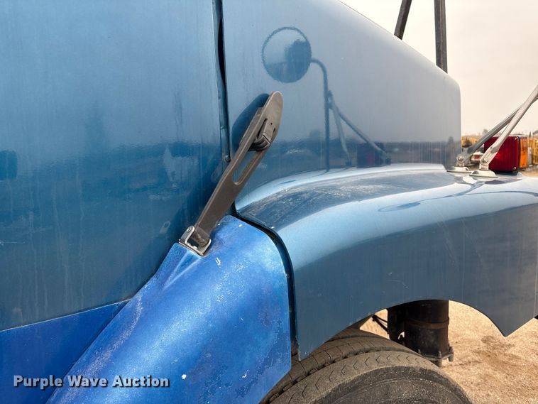 image for item FG2640 1997 Volvo WG-64T flatbed truck