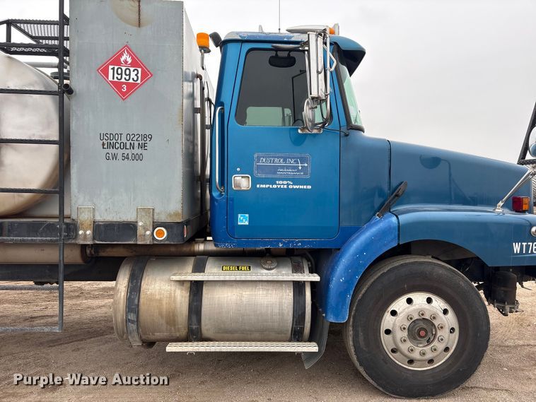 image for item FG2640 1997 Volvo WG-64T flatbed truck