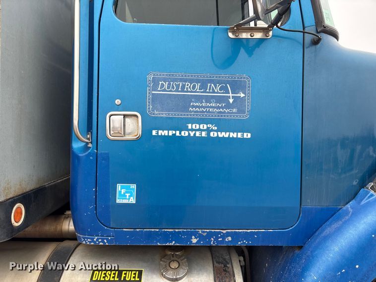 image for item FG2640 1997 Volvo WG-64T flatbed truck