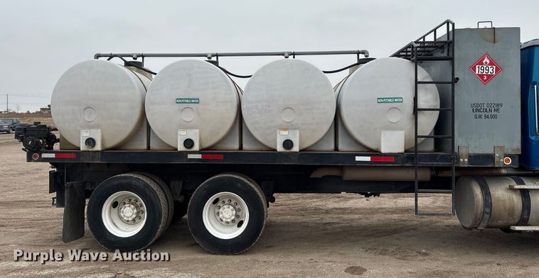 image for item FG2640 1997 Volvo WG-64T flatbed truck