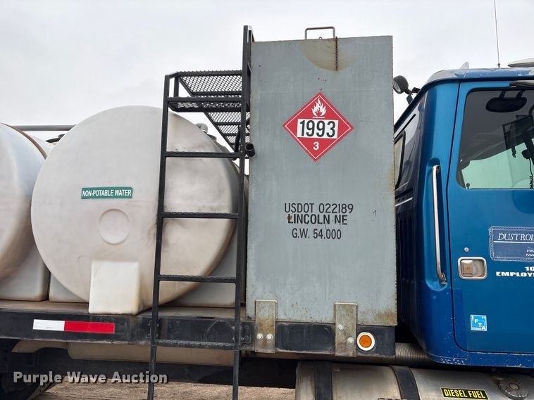 image for item FG2640 1997 Volvo WG-64T flatbed truck