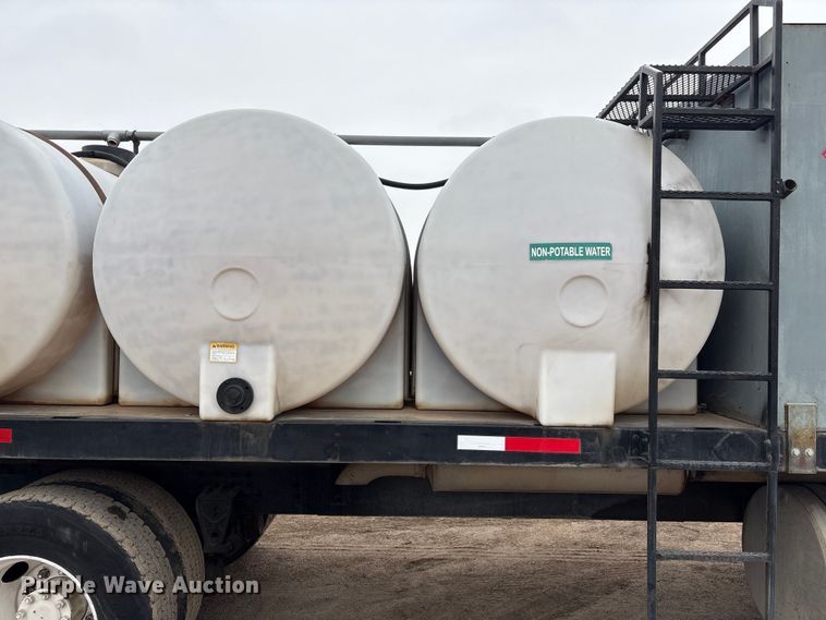 image for item FG2640 1997 Volvo WG-64T flatbed truck