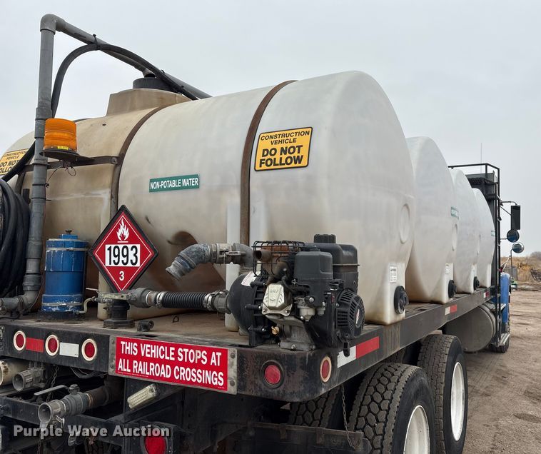 image for item FG2640 1997 Volvo WG-64T flatbed truck