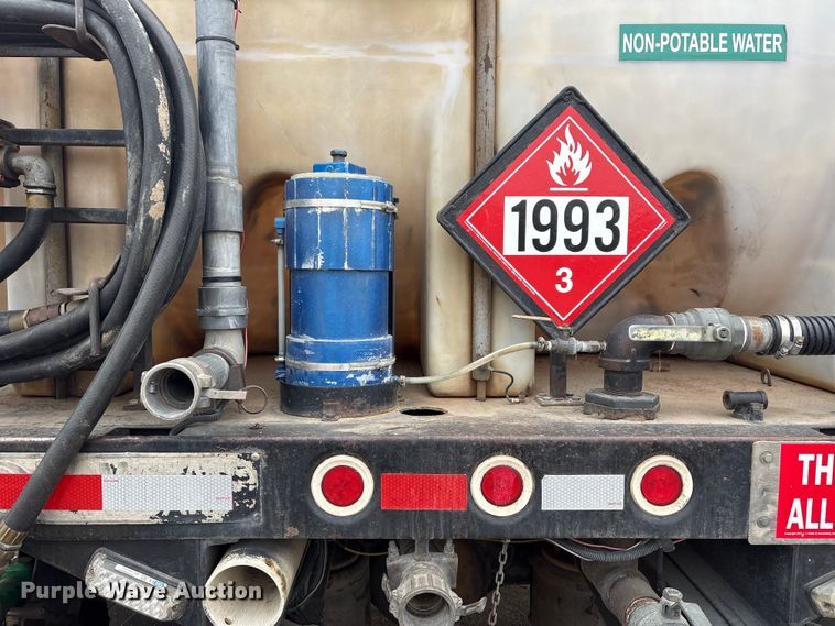 image for item FG2640 1997 Volvo WG-64T flatbed truck