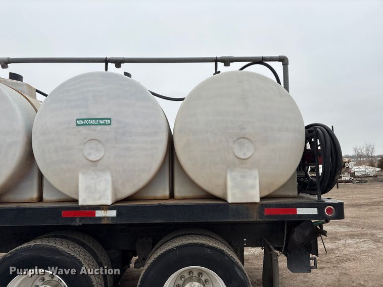 image for item FG2640 1997 Volvo WG-64T flatbed truck