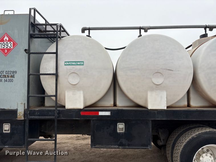 image for item FG2640 1997 Volvo WG-64T flatbed truck