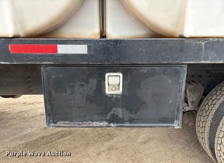 image for item FG2640 1997 Volvo WG-64T flatbed truck