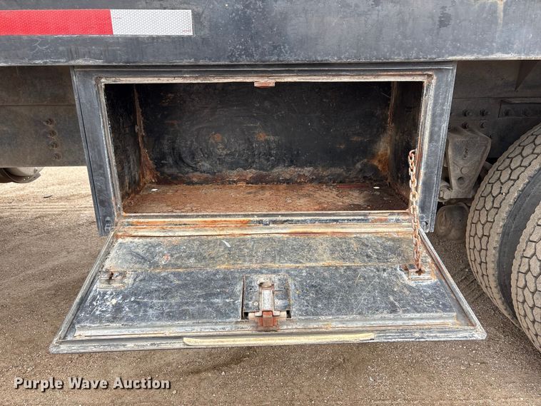 image for item FG2640 1997 Volvo WG-64T flatbed truck