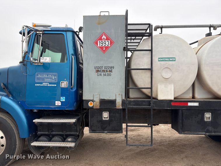 image for item FG2640 1997 Volvo WG-64T flatbed truck