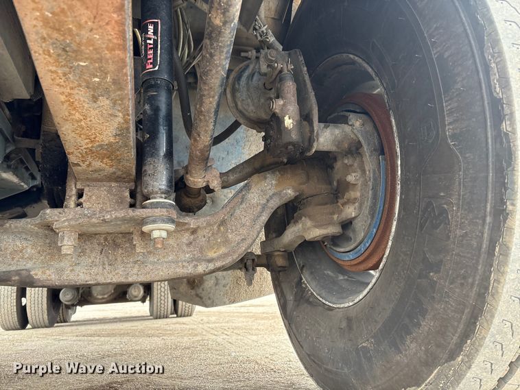 image for item FG2640 1997 Volvo WG-64T flatbed truck