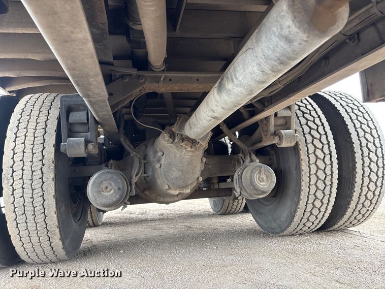 image for item FG2640 1997 Volvo WG-64T flatbed truck