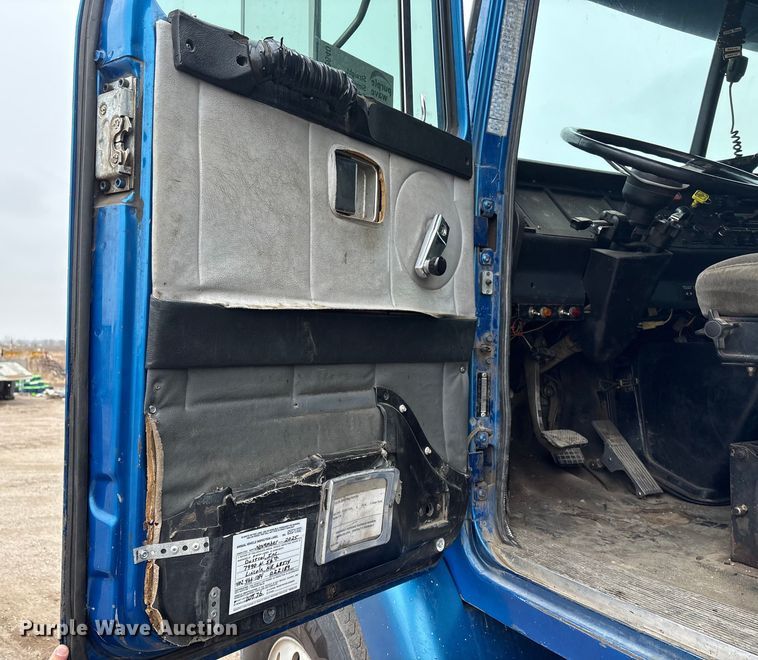 image for item FG2640 1997 Volvo WG-64T flatbed truck