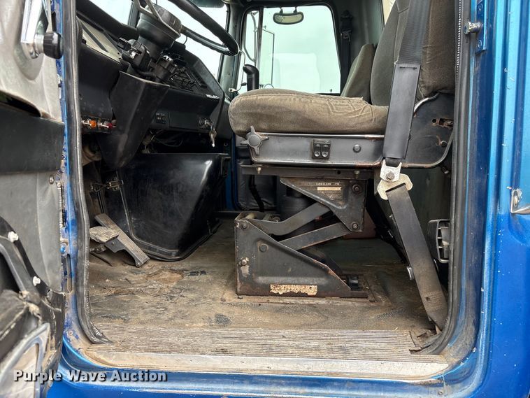 image for item FG2640 1997 Volvo WG-64T flatbed truck