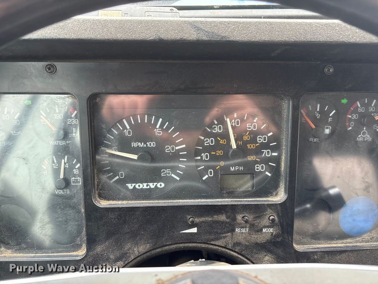 image for item FG2640 1997 Volvo WG-64T flatbed truck