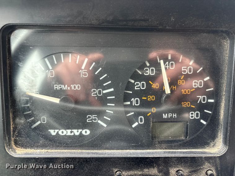 image for item FG2640 1997 Volvo WG-64T flatbed truck