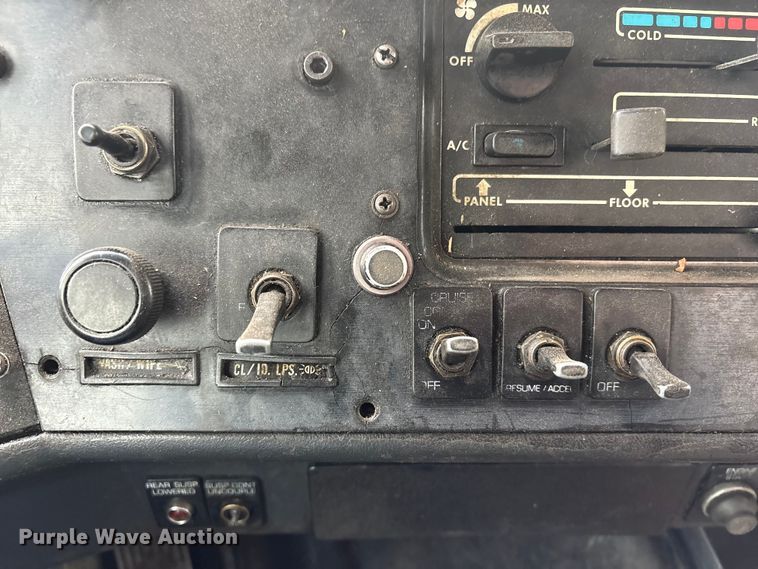 image for item FG2640 1997 Volvo WG-64T flatbed truck