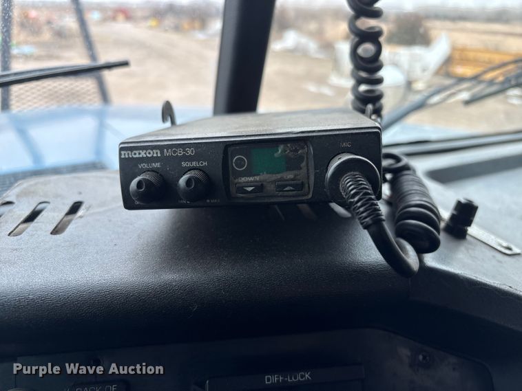 image for item FG2640 1997 Volvo WG-64T flatbed truck