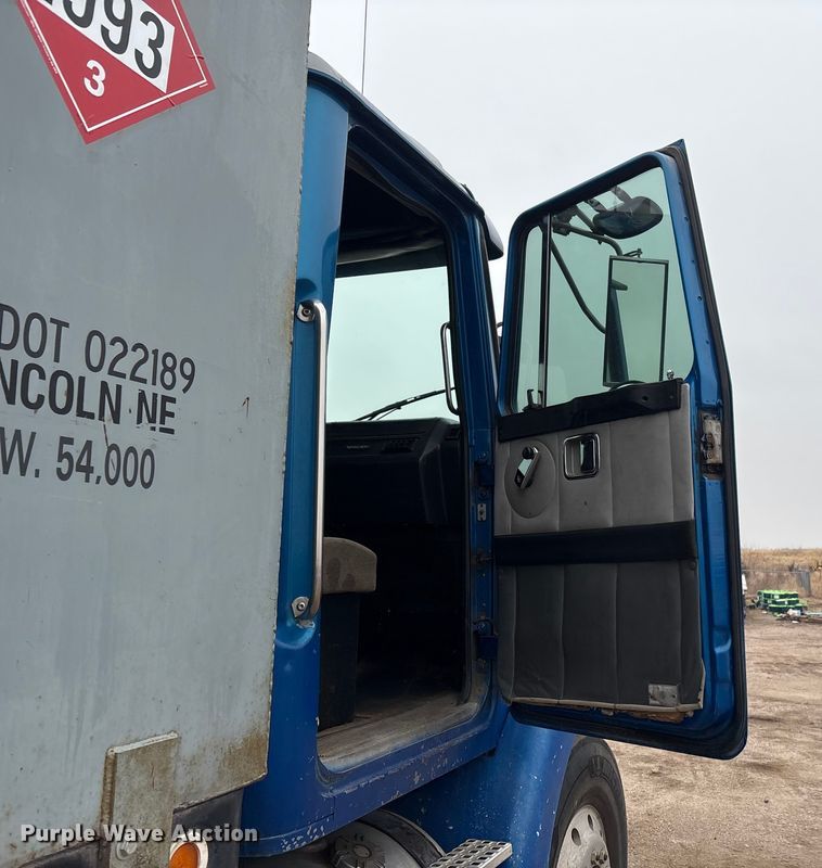 image for item FG2640 1997 Volvo WG-64T flatbed truck