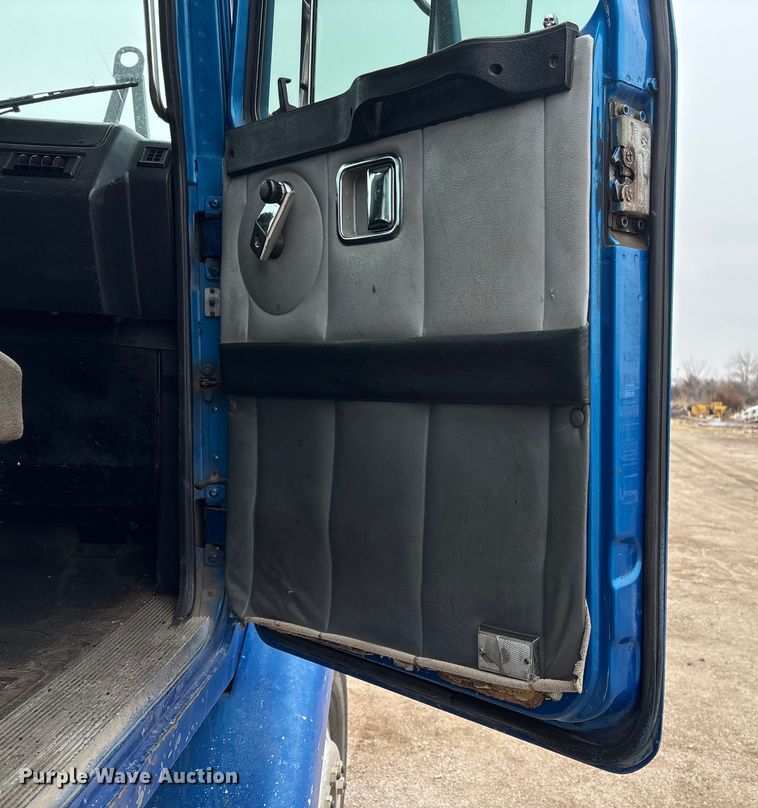 image for item FG2640 1997 Volvo WG-64T flatbed truck