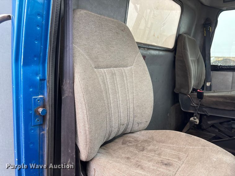 image for item FG2640 1997 Volvo WG-64T flatbed truck