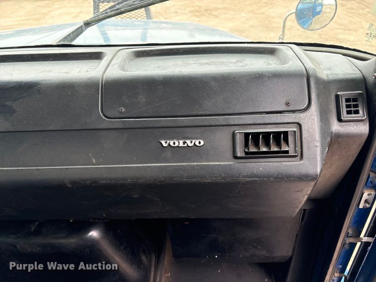 image for item FG2640 1997 Volvo WG-64T flatbed truck