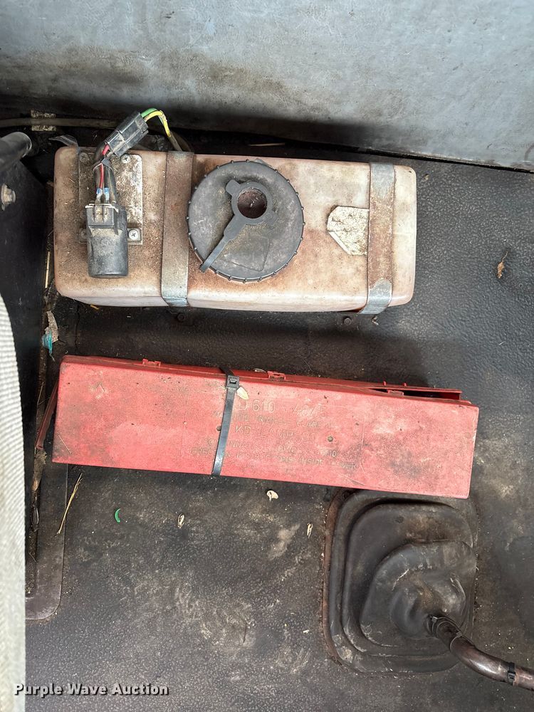 image for item FG2640 1997 Volvo WG-64T flatbed truck