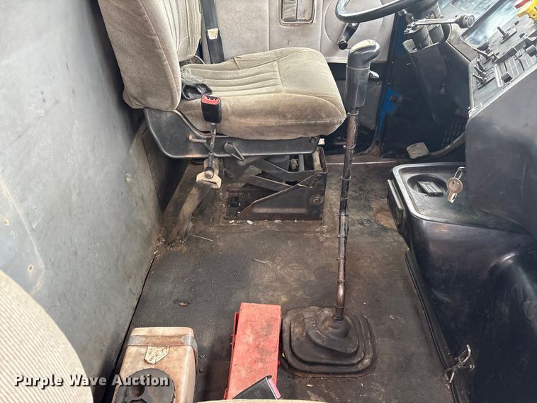 image for item FG2640 1997 Volvo WG-64T flatbed truck