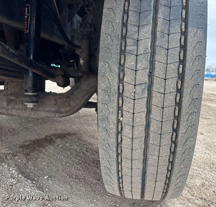 image for item FG2640 1997 Volvo WG-64T flatbed truck