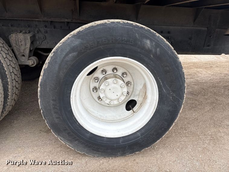 image for item FG2640 1997 Volvo WG-64T flatbed truck