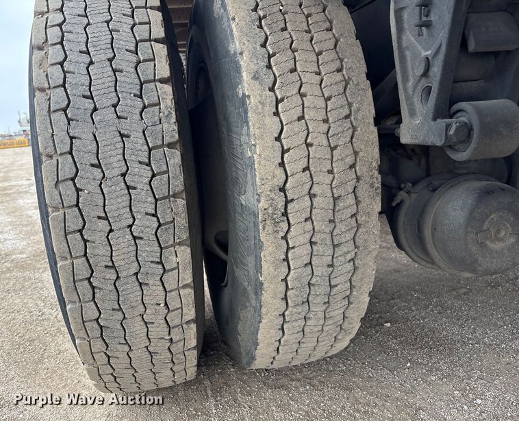 image for item FG2640 1997 Volvo WG-64T flatbed truck