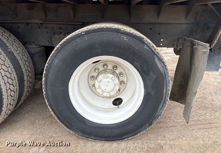 image for item FG2640 1997 Volvo WG-64T flatbed truck